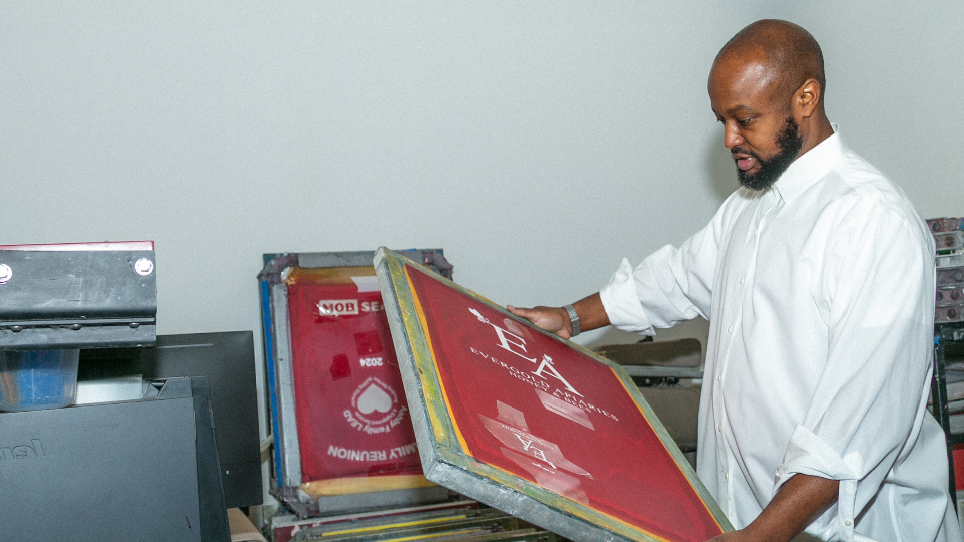 Greg Dennis working with fabric